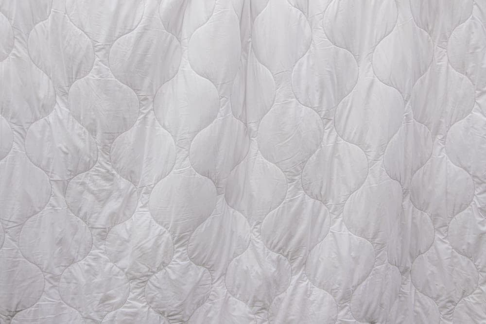 A folded white duvet insert