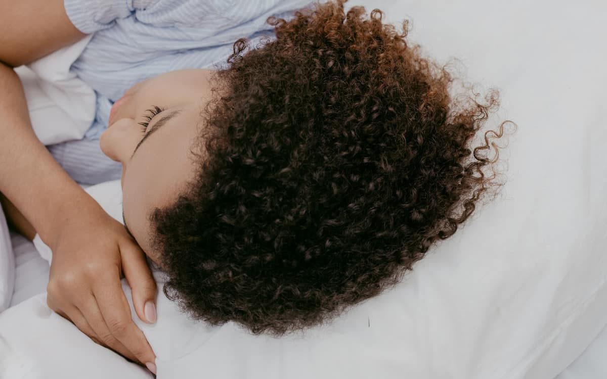 A firm, supportive pillow seen from the side