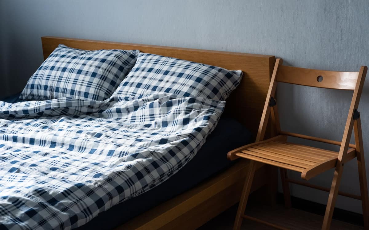 A folded foam mattress topper